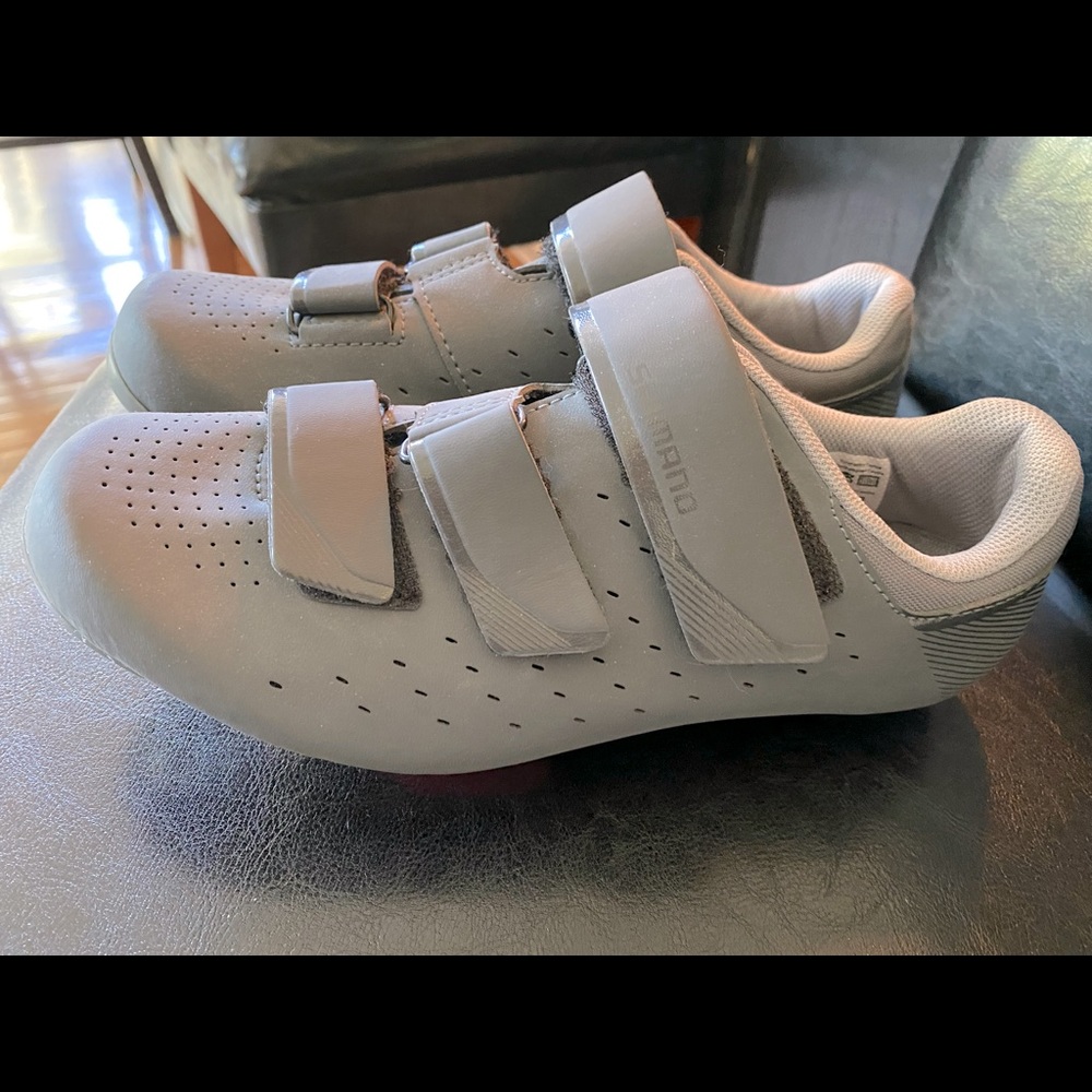 Shimano cycling shoes with cleats.
